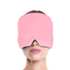 Front-facing view of a woman wearing the RelaxRiser™ HushCrown Comfort Mask in pink, showing full coverage of the forehead and eyes with a V-shaped cutout at the nose for comfort, designed for hot and cold therapy.