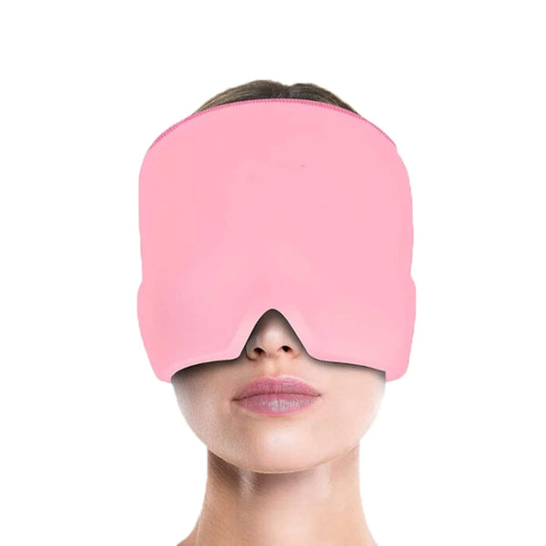 Front-facing view of a woman wearing the RelaxRiser™ HushCrown Comfort Mask in pink, showing full coverage of the forehead and eyes with a V-shaped cutout at the nose for comfort, designed for hot and cold therapy.