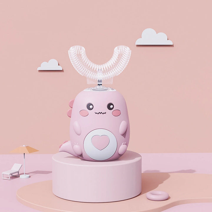Pink dinosaur-themed RelaxRiser™ U-Shaped Electric Toothbrush for kids, featuring a heart design and soft silicone brush head on a pastel pink background.